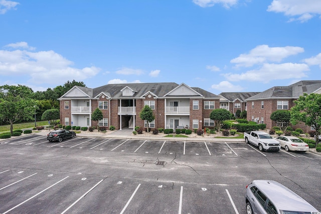 2005 Silvercrest Dr Unit 32F, Myrtle Beach, SC 29579 - view of building exterior featuring uncovered parking