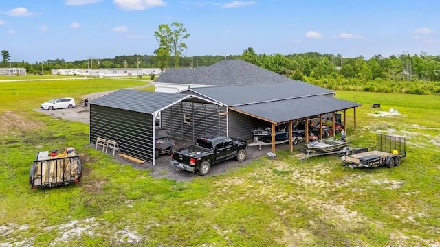 4486 Bethel Rd, Aynor, SC 29511 - back of property featuring a pole building and an outbuilding