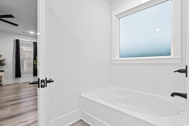 4486 Bethel Rd, Aynor, SC 29511 - full bath with a garden tub, healthy amount of natural light, ceiling fan, wood finished floors, and recessed lighting