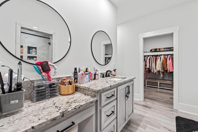 4486 Bethel Rd, Aynor, SC 29511 - full bathroom with vanity, wood finished floors, and a spacious closet