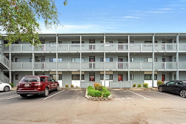 7700 Porcher Dr Unit 3205, Myrtle Beach, SC 29572 - view of apartment building / complex with uncovered parking
