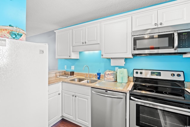 7700 Porcher Dr Unit 3205, Myrtle Beach, SC 29572 - kitchen featuring appliances with stainless steel finishes and white cabinetry
