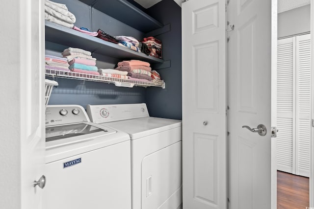 7700 Porcher Dr Unit 3205, Myrtle Beach, SC 29572 - washroom with separate washer and dryer and wood finished floors