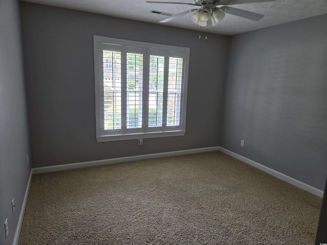 6542 Wellington Dr, Murrells Inlet, SC 29576 - carpeted empty room featuring a ceiling fan and baseboards
