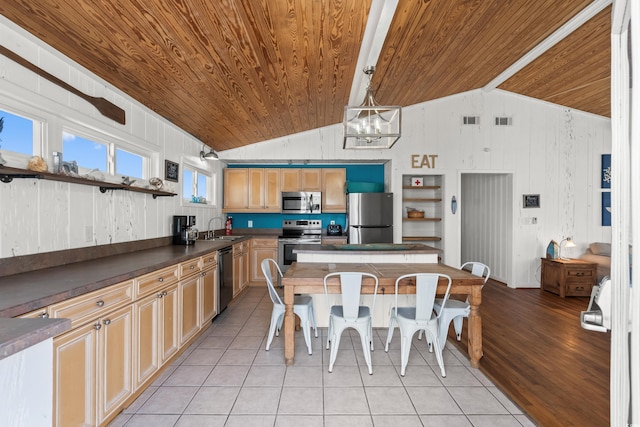 204 55th Ave N, North Myrtle Beach, SC 29582 - dining room featuring wood ceiling, vaulted ceiling, light tile patterned floors, a chandelier, and wood walls