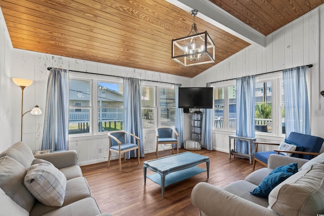 204 55th Ave N, North Myrtle Beach, SC 29582 - living area featuring wooden ceiling, lofted ceiling, a chandelier, wood finished floors, and wood walls