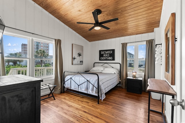 204 55th Ave N, North Myrtle Beach, SC 29582 - bedroom with wood ceiling, lofted ceiling, light wood-style flooring, and a ceiling fan