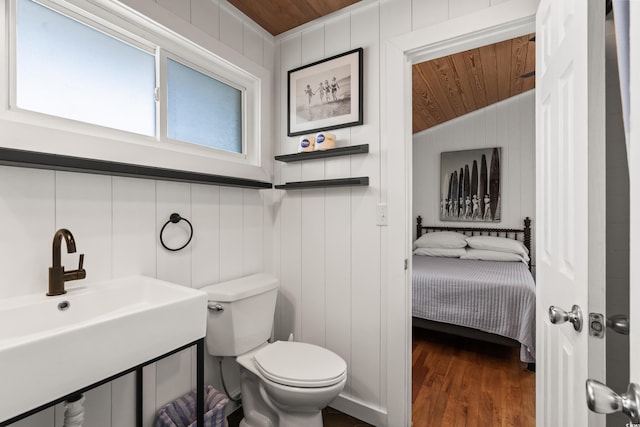 204 55th Ave N, North Myrtle Beach, SC 29582 - bathroom featuring wooden ceiling, wood finished floors, ensuite bath, and vaulted ceiling