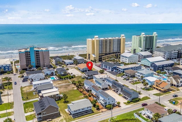 204 55th Ave N, North Myrtle Beach, SC 29582 - aerial view of waterfront with a beach