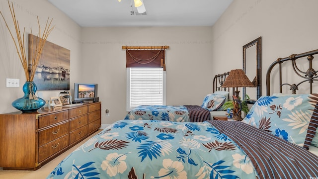 4142 Hibiscus Dr Unit 102, Little River, SC 29566 - bedroom featuring light carpet and ceiling fan
