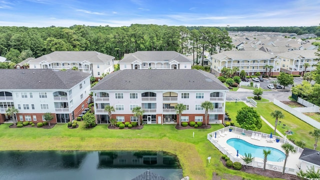 4142 Hibiscus Dr Unit 102, Little River, SC 29566 - aerial view of residential area with a pool and a nearby body of water