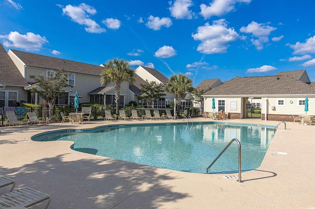 100 Culpepper Way Unit 1003, Myrtle Beach, SC 29579 - community pool featuring a patio area