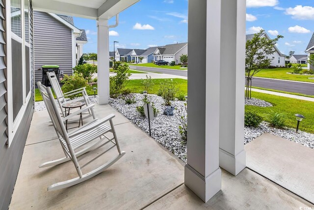 1898 Moonseed Dr, Longs, SC 29568 - covered porch with a residential view