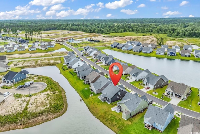 1898 Moonseed Dr, Longs, SC 29568 - aerial perspective of suburban area featuring a large body of water and a heavily wooded area