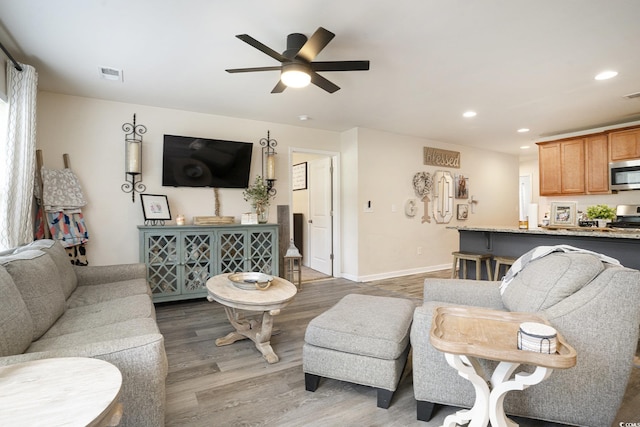 247GROVEPARK Grove Park Loop, Murrells Inlet, SC 29576 - living room with recessed lighting, wood finished floors, and a ceiling fan