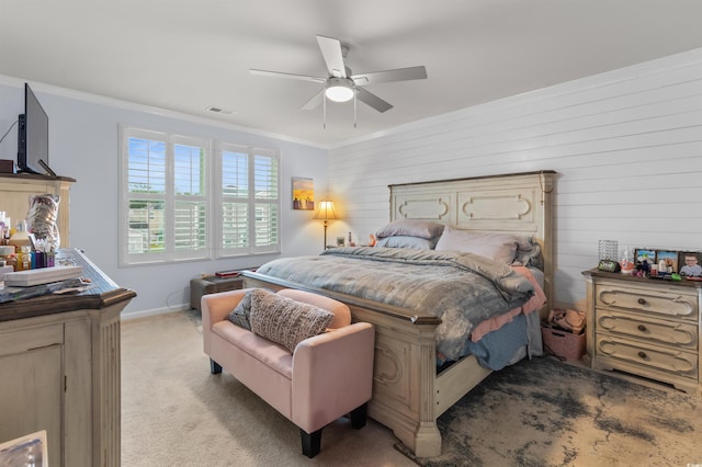 1078 Saltgrass Way, Myrtle Beach, SC 29588 - bedroom featuring light carpet, ornamental molding, ceiling fan, and wood walls