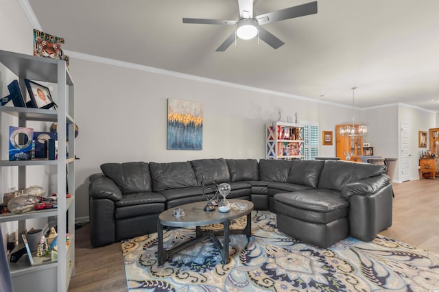1078 Saltgrass Way, Myrtle Beach, SC 29588 - living room featuring wood finished floors, a chandelier, ceiling fan, and ornamental molding