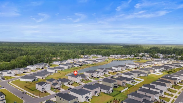 1078 Saltgrass Way, Myrtle Beach, SC 29588 - aerial perspective of suburban area featuring a forest and a large body of water