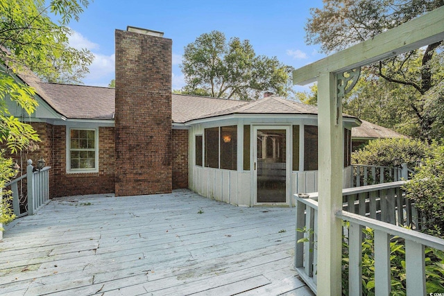 4920 Meadow St, Loris, SC 29569 - wooden deck featuring a sunroom