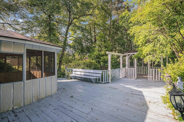 4920 Meadow St, Loris, SC 29569 - deck featuring a sunroom