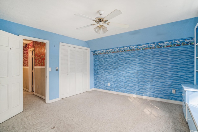 4920 Meadow St, Loris, SC 29569 - unfurnished bedroom featuring carpet, a ceiling fan, and a closet