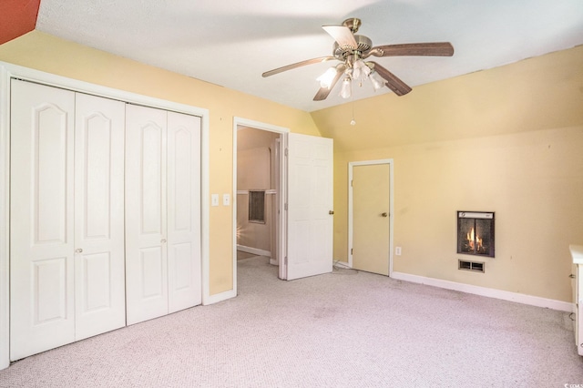4920 Meadow St, Loris, SC 29569 - unfurnished bedroom with light carpet, a closet, ceiling fan, and lofted ceiling