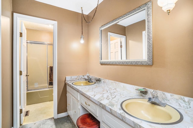 4920 Meadow St, Loris, SC 29569 - full bathroom featuring double vanity and shower / bath combination with glass door