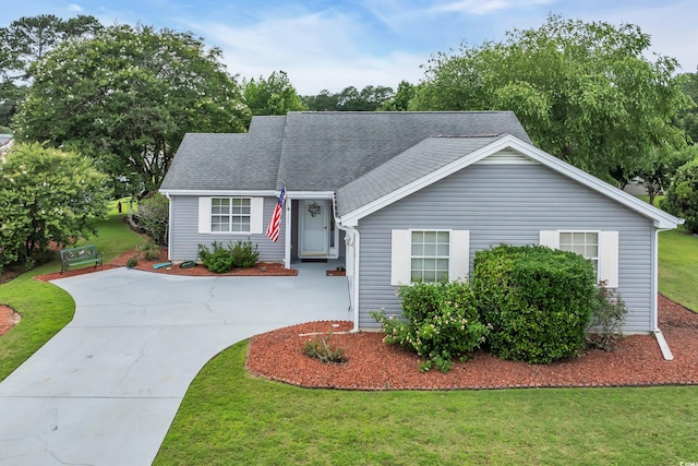1206 Formby Ct, Myrtle Beach, SC 29588 - view of front of home with a front yard, roof with shingles, and driveway