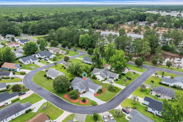 1206 Formby Ct, Myrtle Beach, SC 29588 - aerial view of residential area with a heavily wooded area
