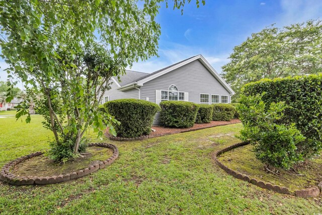 1206 Formby Ct, Myrtle Beach, SC 29588 - view of home's exterior with a yard