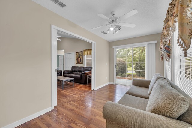 1206 Formby Ct, Myrtle Beach, SC 29588 - living room with ceiling fan and wood finished floors