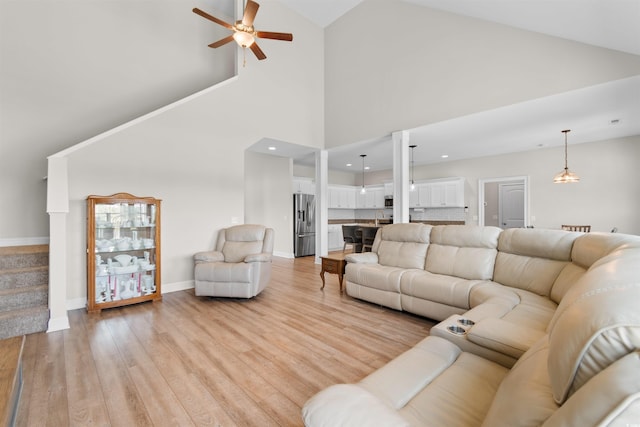 3617 Pasture Rd, Aynor, SC 29511 - living area featuring ceiling fan, light wood-type flooring, high vaulted ceiling, stairs, and recessed lighting