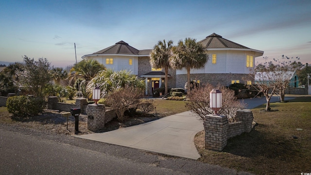 4552 River Rd, Little River, SC 29566 - view of front of home with concrete driveway
