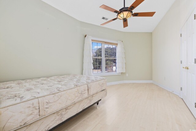 4552 River Rd, Little River, SC 29566 - bedroom featuring wood finished floors and a ceiling fan