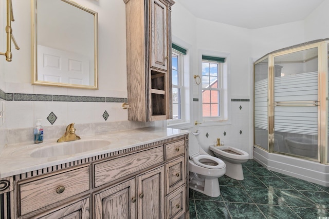 4552 River Rd, Little River, SC 29566 - full bathroom with a bidet, vanity, and an enclosed shower
