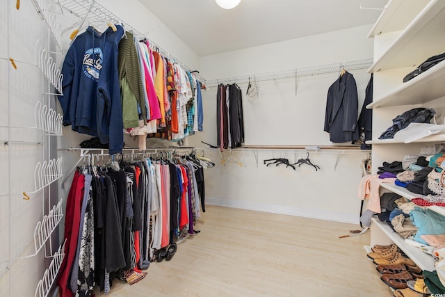 4552 River Rd, Little River, SC 29566 - walk in closet featuring wood finished floors