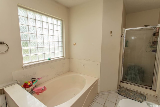 318 Muirfield Rd, Myrtle Beach, SC 29588 - bathroom featuring a bath, a shower stall, and tile patterned flooring