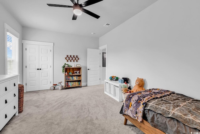 1216 Newell Dr, Myrtle Beach, SC 29588 - bedroom with light carpet, a closet, and a ceiling fan