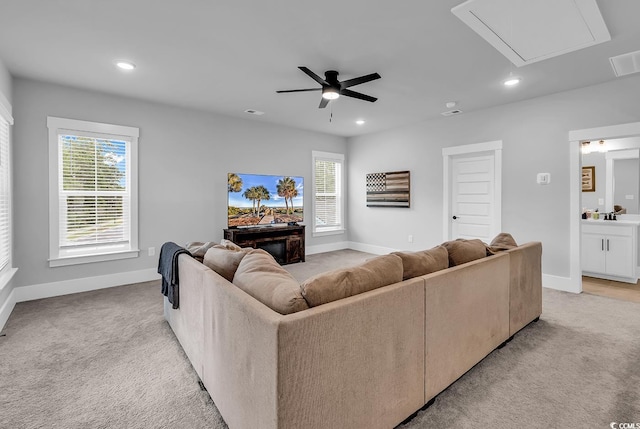 1216 Newell Dr, Myrtle Beach, SC 29588 - living room with attic access, recessed lighting, ceiling fan, light carpet, and plenty of natural light