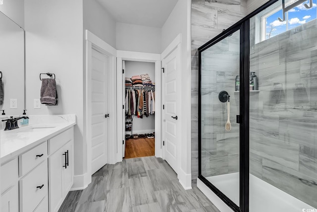 1216 Newell Dr, Myrtle Beach, SC 29588 - full bath featuring a walk in closet, a shower stall, and vanity
