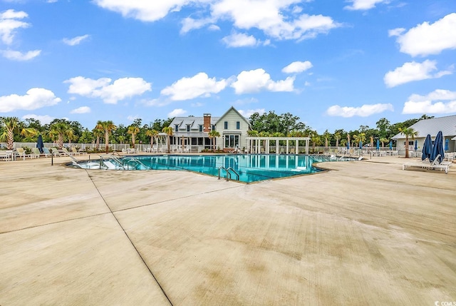 1216 Newell Dr, Myrtle Beach, SC 29588 - community pool with a patio