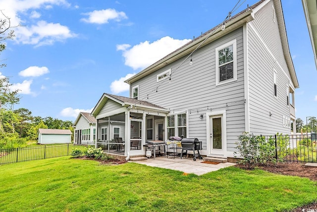1216 Newell Dr, Myrtle Beach, SC 29588 - back of property with a sunroom, a fenced backyard, and a patio