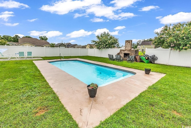 209 Haley Brooke Dr, Conway, SC 29526 - view of swimming pool featuring a fenced backyard, a patio area, and an outdoor stone fireplace