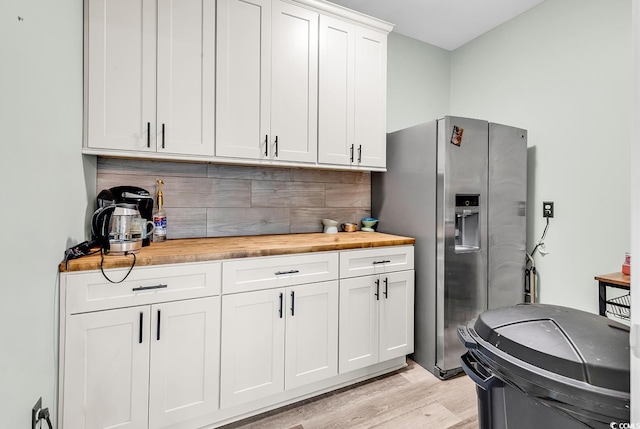 209 Haley Brooke Dr, Conway, SC 29526 - kitchen featuring butcher block counters, stainless steel refrigerator with ice dispenser, decorative backsplash, and light wood-style flooring