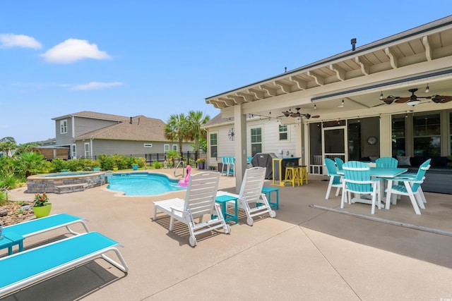 1715 Lake Egret Dr, North Myrtle Beach, SC 29582 - view of pool with a ceiling fan, a patio, a pool with connected hot tub, and outdoor dining space