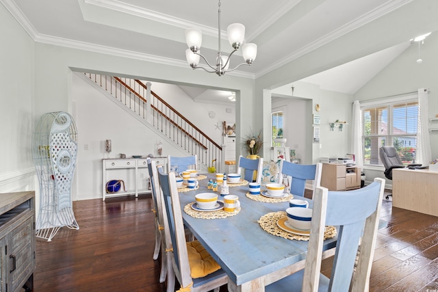 1715 Lake Egret Dr, North Myrtle Beach, SC 29582 - dining space featuring hardwood / wood-style floors, stairway, a chandelier, ornamental molding, and a tray ceiling