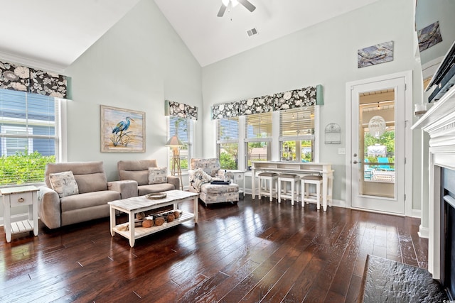 1715 Lake Egret Dr, North Myrtle Beach, SC 29582 - living room featuring high vaulted ceiling, a ceiling fan, wood-type flooring, and a fireplace with flush hearth