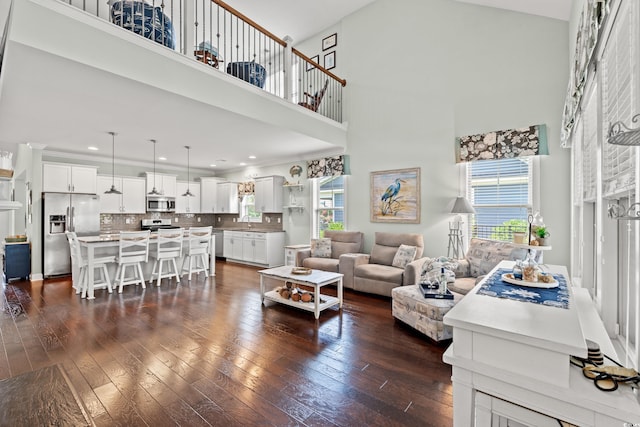 1715 Lake Egret Dr, North Myrtle Beach, SC 29582 - living area featuring a high ceiling, dark wood-type flooring, and recessed lighting
