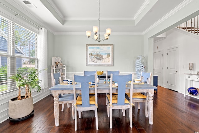 1715 Lake Egret Dr, North Myrtle Beach, SC 29582 - dining room with a raised ceiling, a chandelier, hardwood / wood-style floors, and crown molding