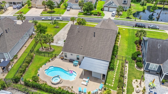 1715 Lake Egret Dr, North Myrtle Beach, SC 29582 - aerial view of residential area with a pool and a large body of water